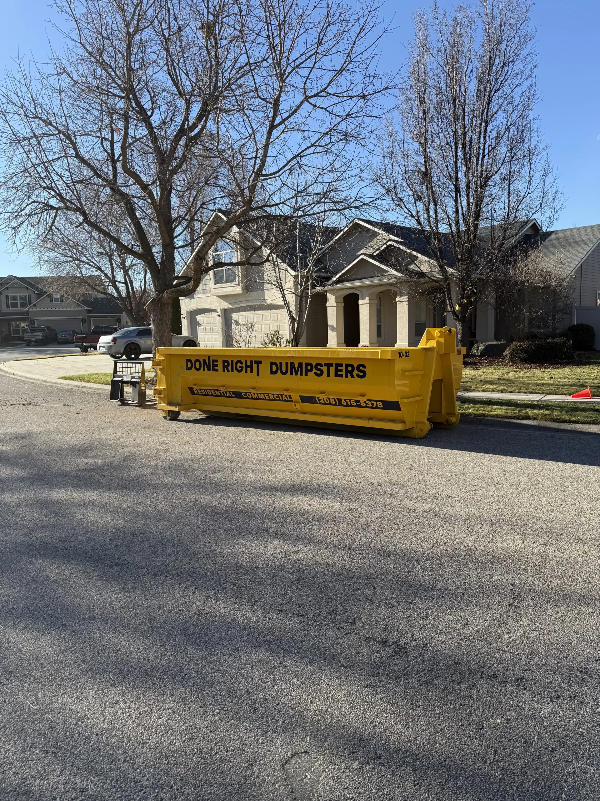 Done Right Dumpsters 10 yard dirt dumpster set curbside