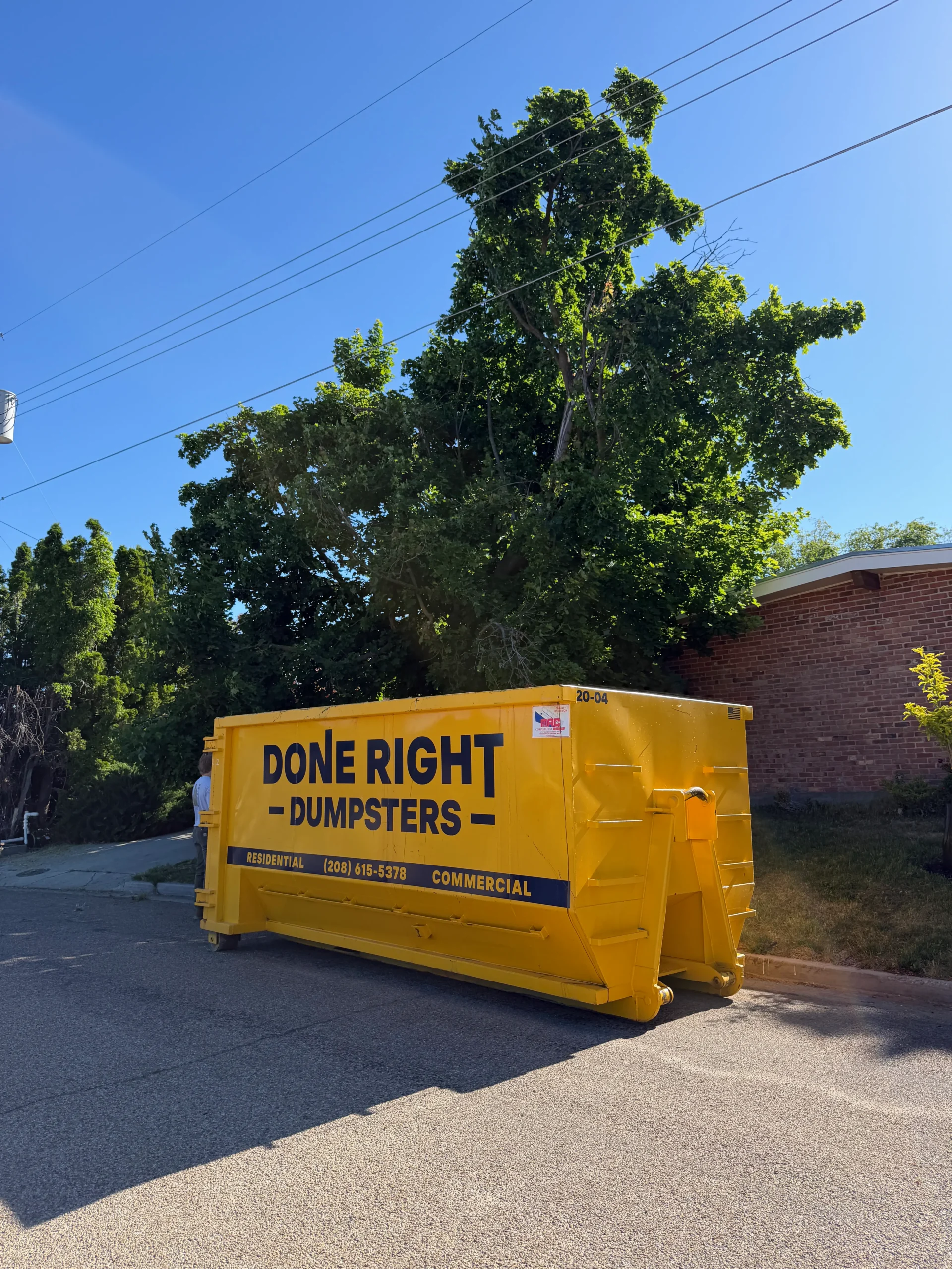 Done Right Dumpsters 20 yard roll-off dumpster on a job site